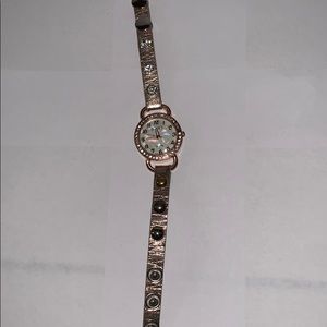 Women’s watch | “diamond” studs | needs a battery
